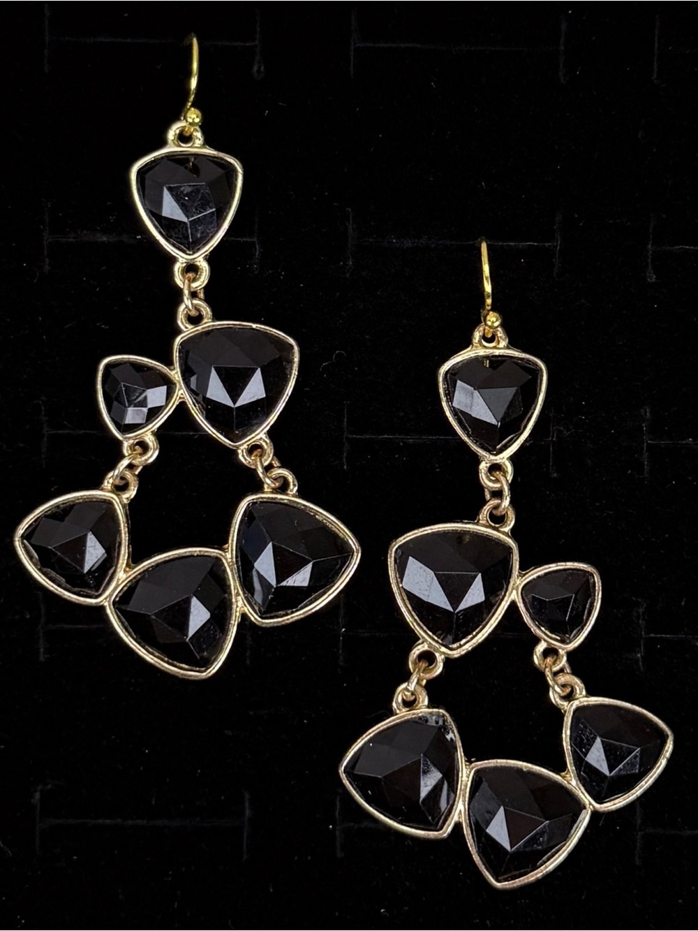 Pretty black and goldtone weighted dangle pierced earrings